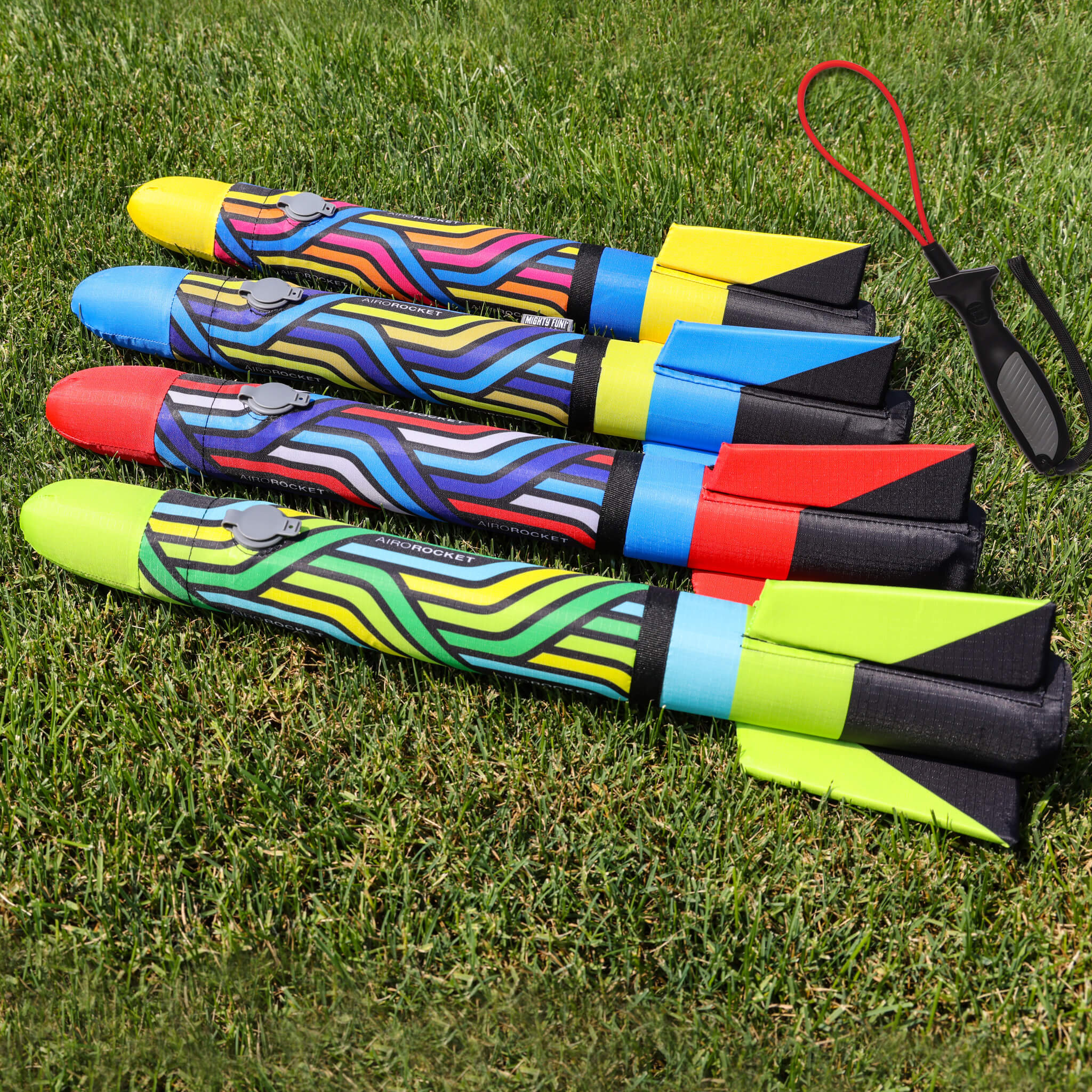 Airo Rocket toy rocket in all 4 colors: red, lime, yellow and blue outside by Mighty Fun!