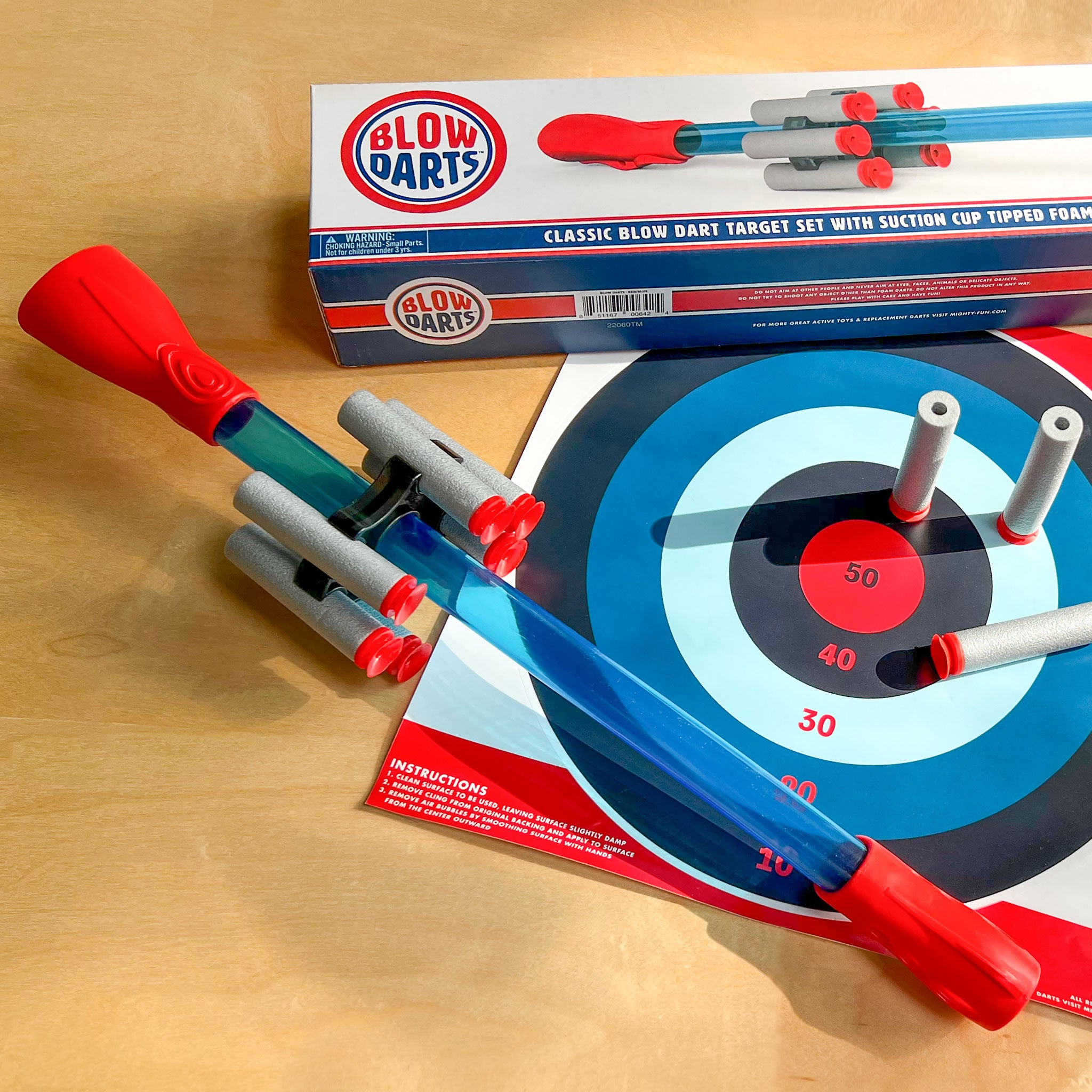 Blow Darts target set by Mighty Fun! Includes 6 darts, ammo holder and target.