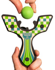 Green Racing best slingshot being loaded with a soft foam ball. Mischief Maker by Mighty Fun!
