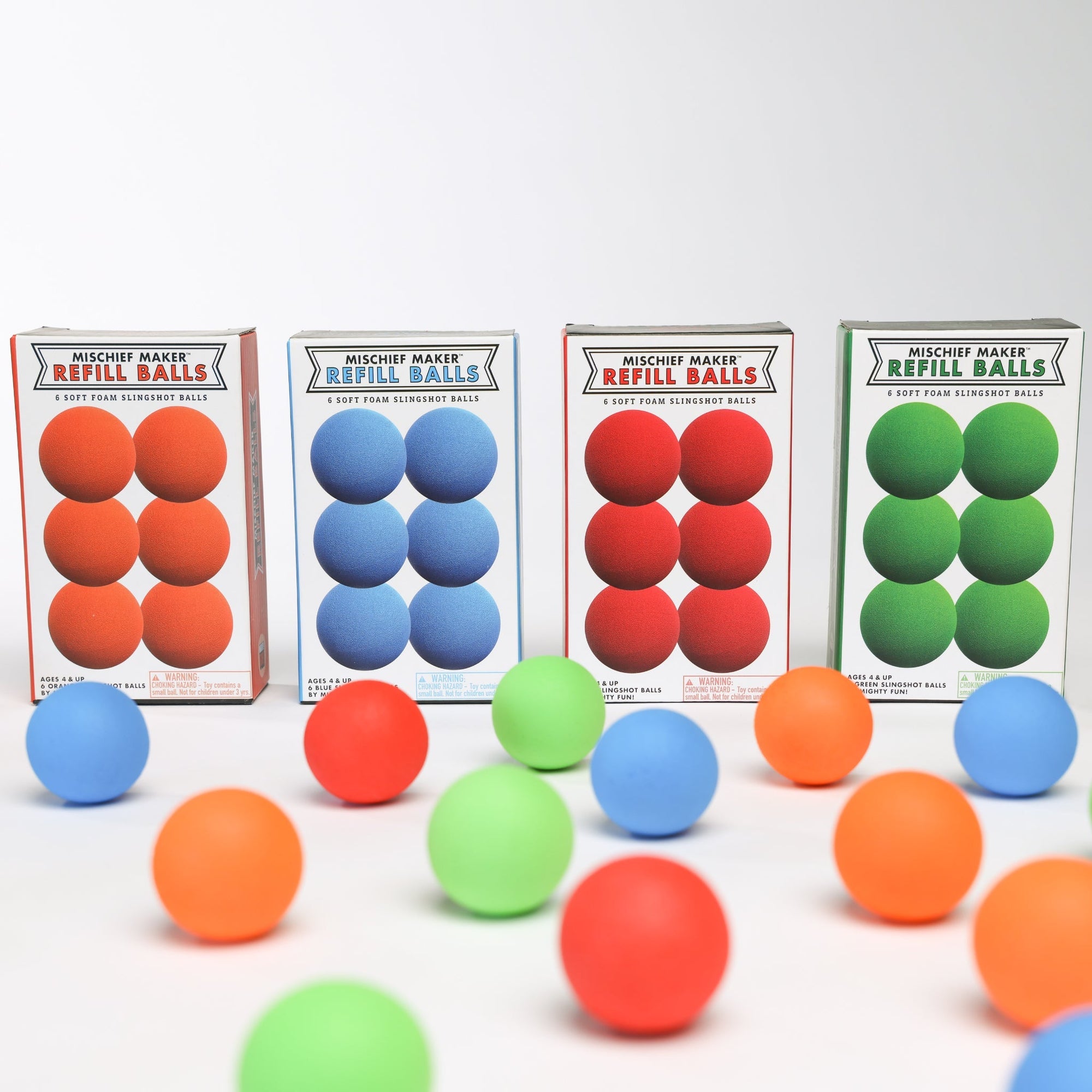 Foam slingshot balls for Mischief Maker toy slingshot by Mighty Fun! Red, green, blue, orange box of 6 balls per pack.