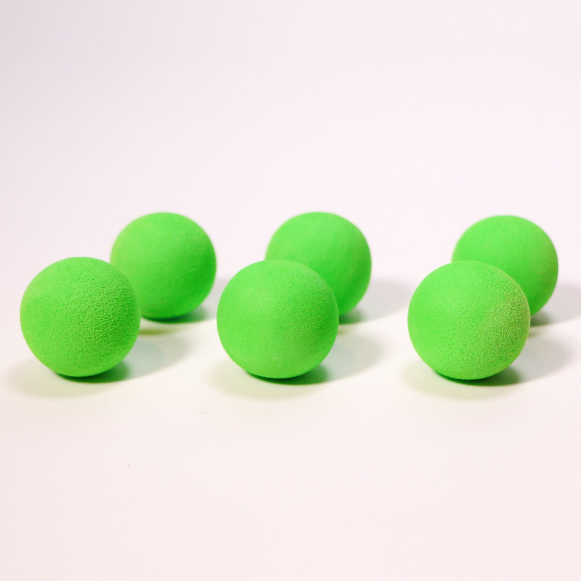 Green foam slingshot balls for Mischief Maker toy slingshot by Mighty Fun! 6 balls per pack.