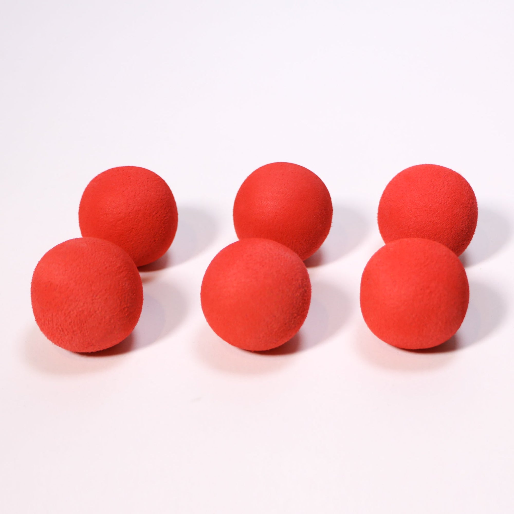 Red foam slingshot balls for Mischief Maker toy slingshot by Mighty Fun! 6 balls per pack.