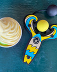 Yellow Surf’s Up toy slingshot with frozen yogurt. Mischief Maker by Mighty Fun!