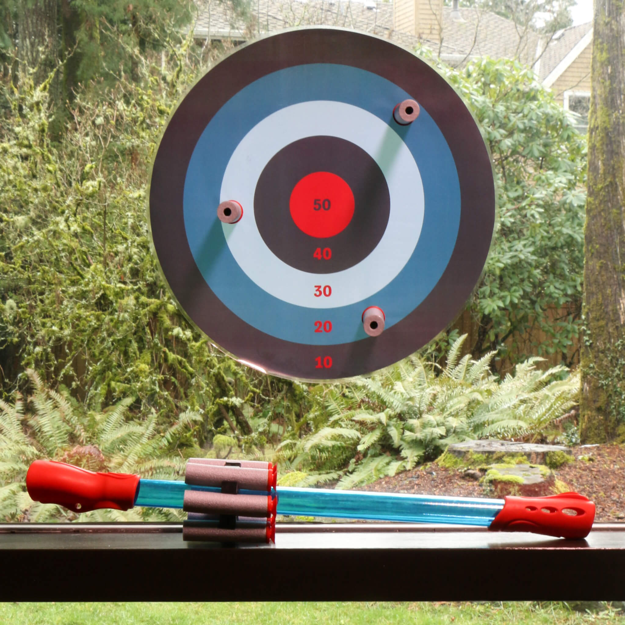 Blow Darts target set by Mighty Fun! Includes 6 darts, ammo holder and target shown on window.