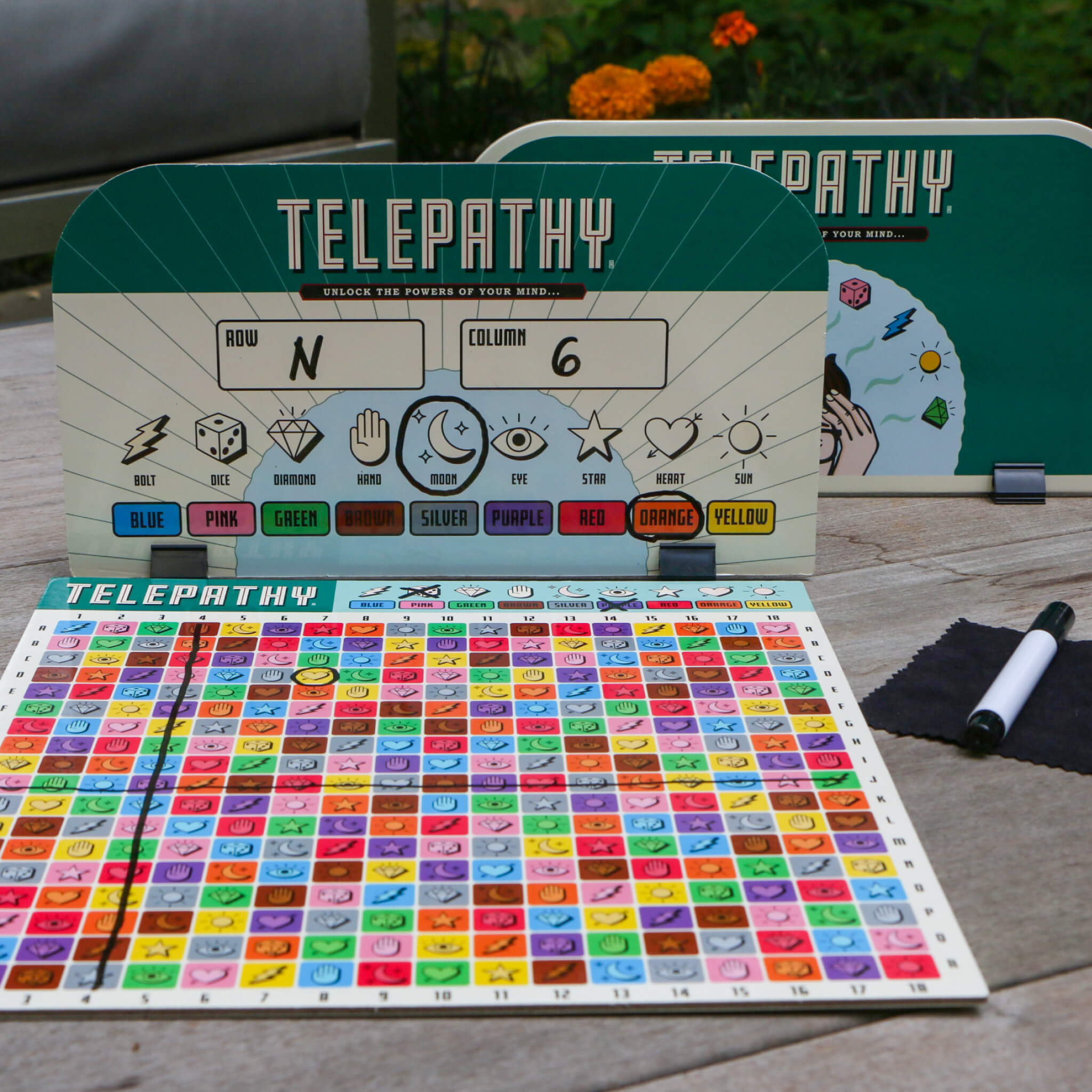 Telepathy Strategy board game details. Game Board being used. For Ages 10 up by Mighty Fun! 