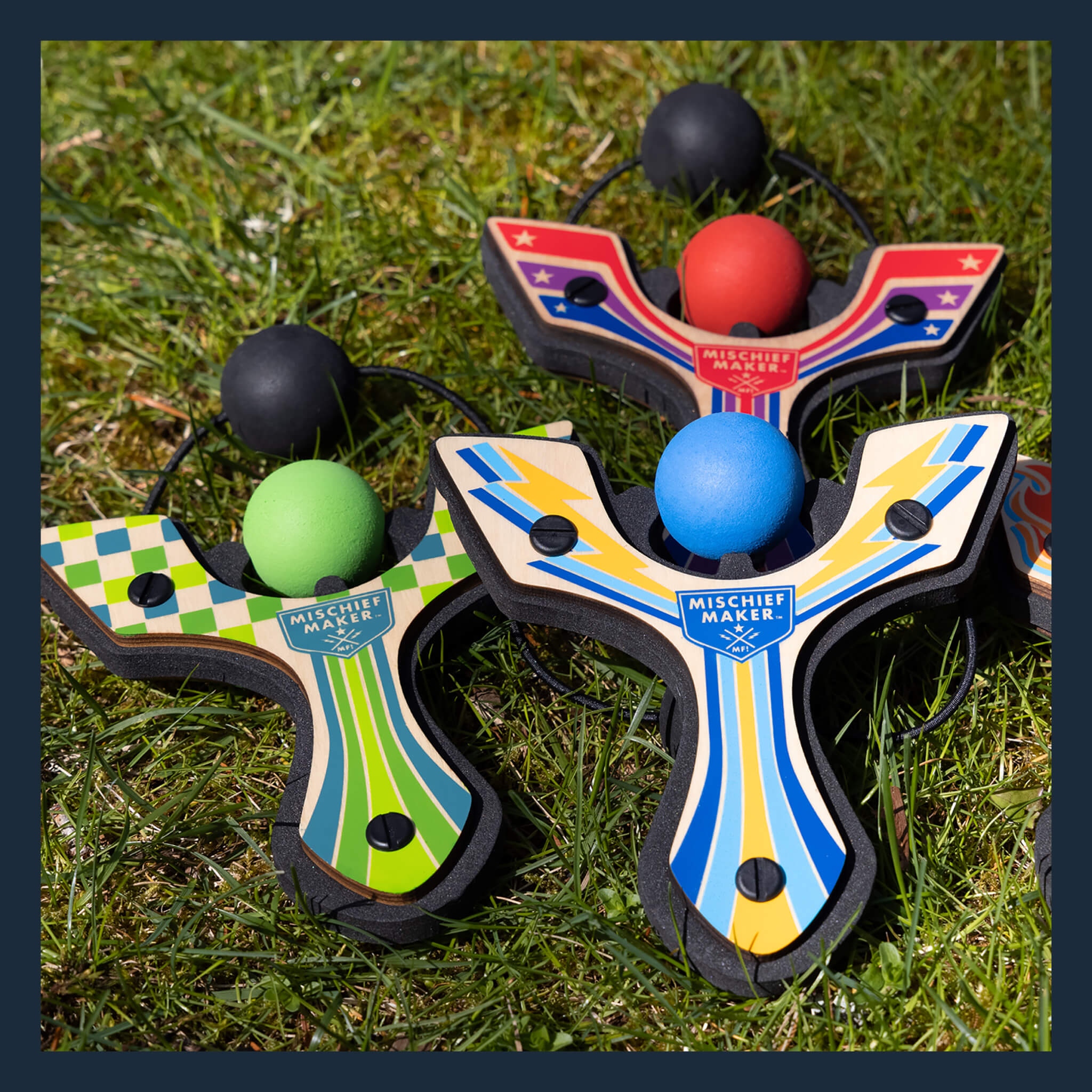 Racing best slingshot on the grass including blue, green, and red by Mighty Fun!