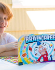 Kids Playing Brain Freeze Strategy board game by Mighty Fun! Ages 5 up.