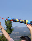 Blue Airo Rocket toy rocket being launched outside. By Mighty Fun!