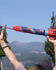 Red Airo Rocket toy rocket being launched outside. By Mighty Fun!