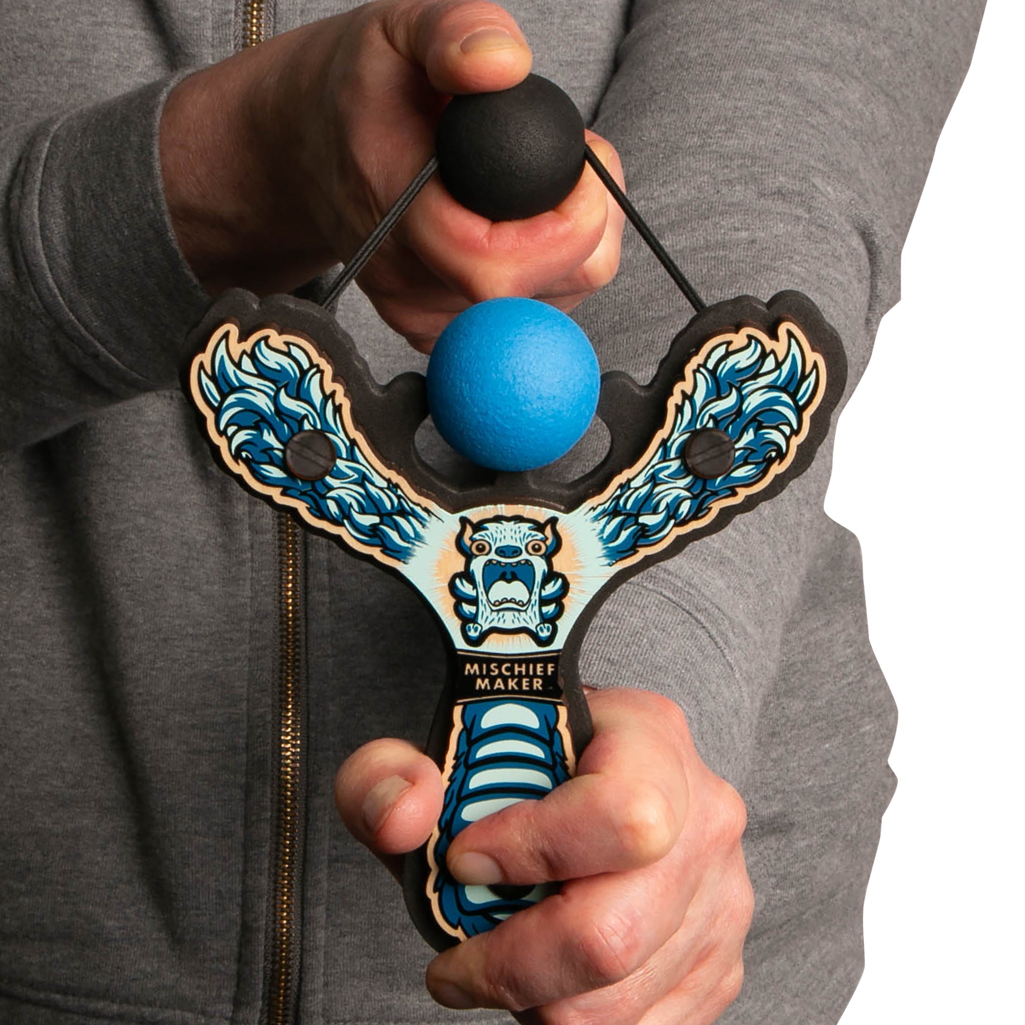 Blue Monster toy slingshot being shot by 6 year old boy. Mischief Maker by Mighty Fun!