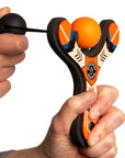 Orange Classic wood slingshot being launched. Mischief Maker by Mighty Fun!