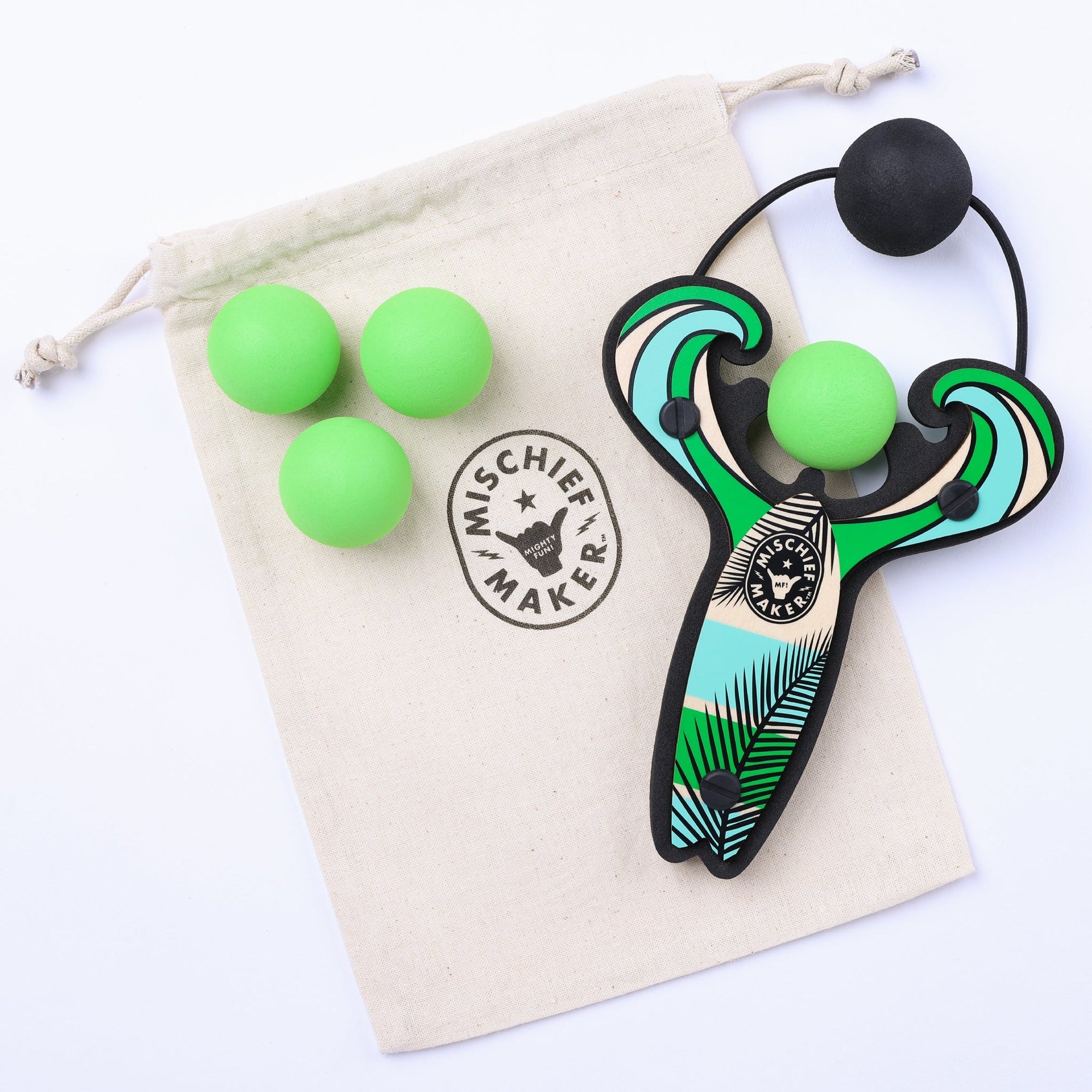 Green Surf’s Up toy slingshot with 4 soft foam balls and storage bag. Mischief Maker by Mighty Fun!