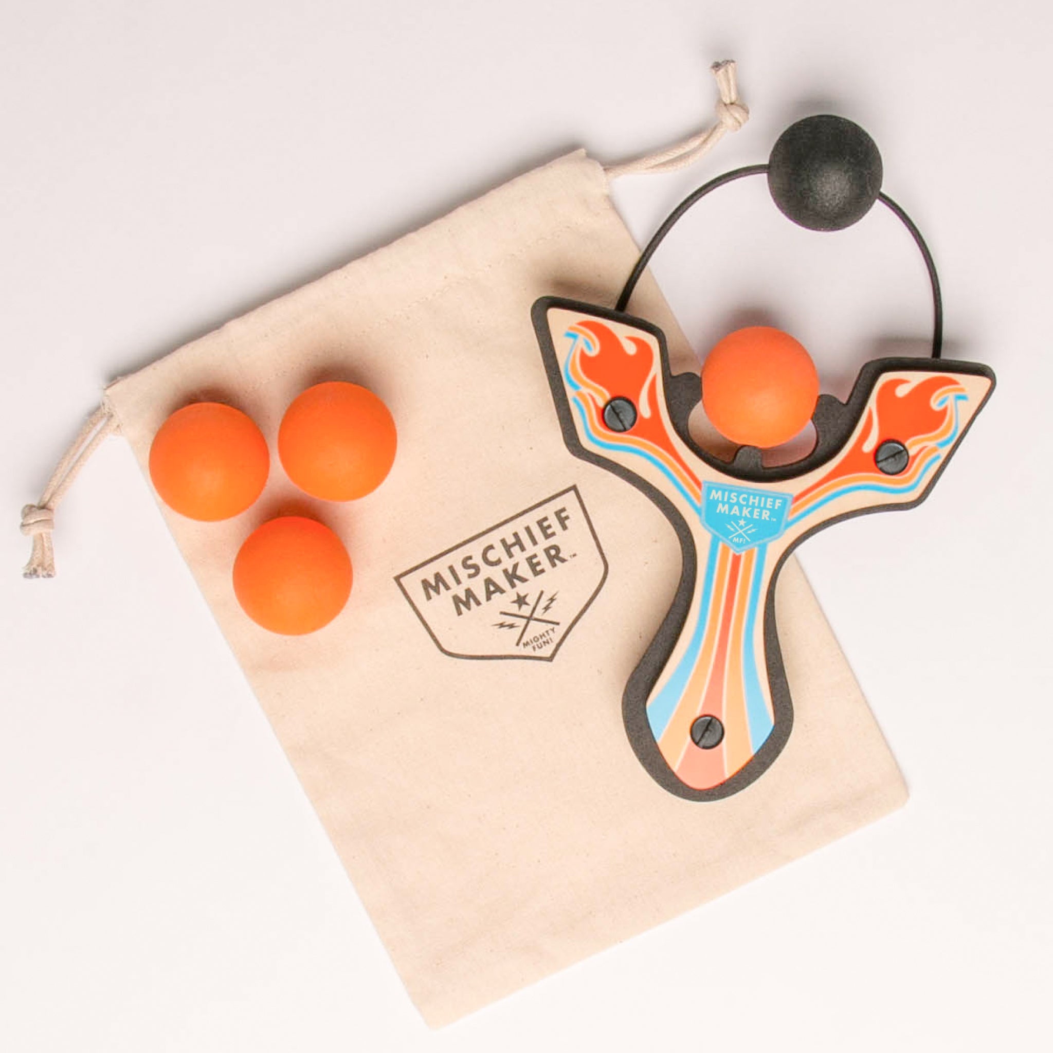 Orange Racing best slingshot with 4 soft foam balls and storage bag. Mischief Maker by Mighty Fun!