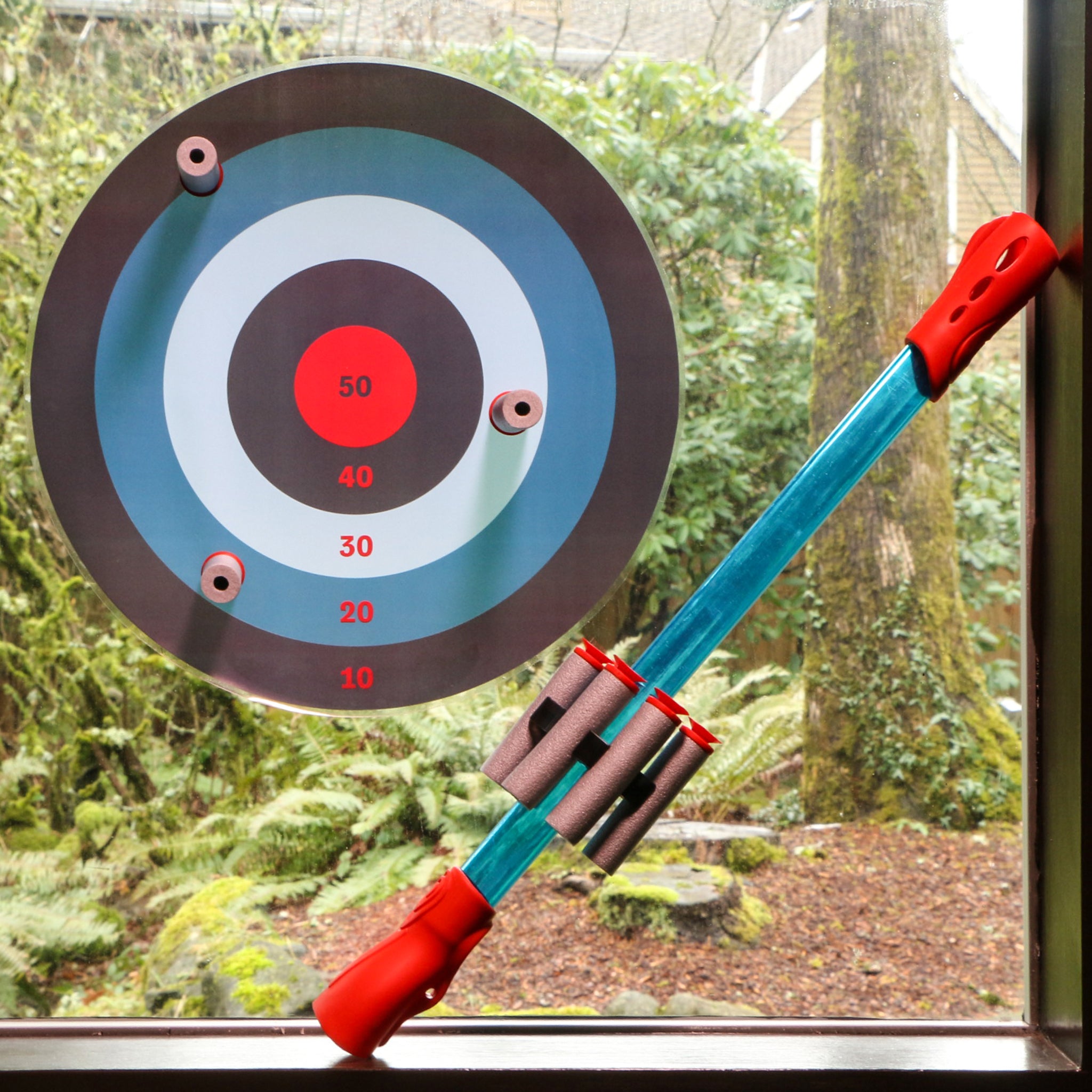 Blow Darts target set by Mighty Fun! Includes 6 darts, ammo holder and target.